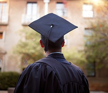 Thinking graduate on university campus